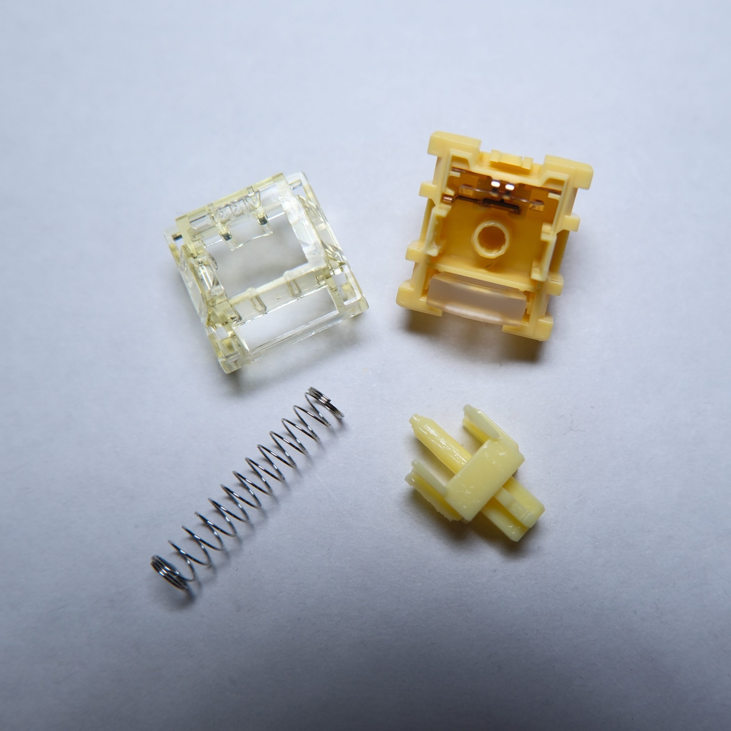Akko Creamy Yellow Pro (V5) switch disassembled.