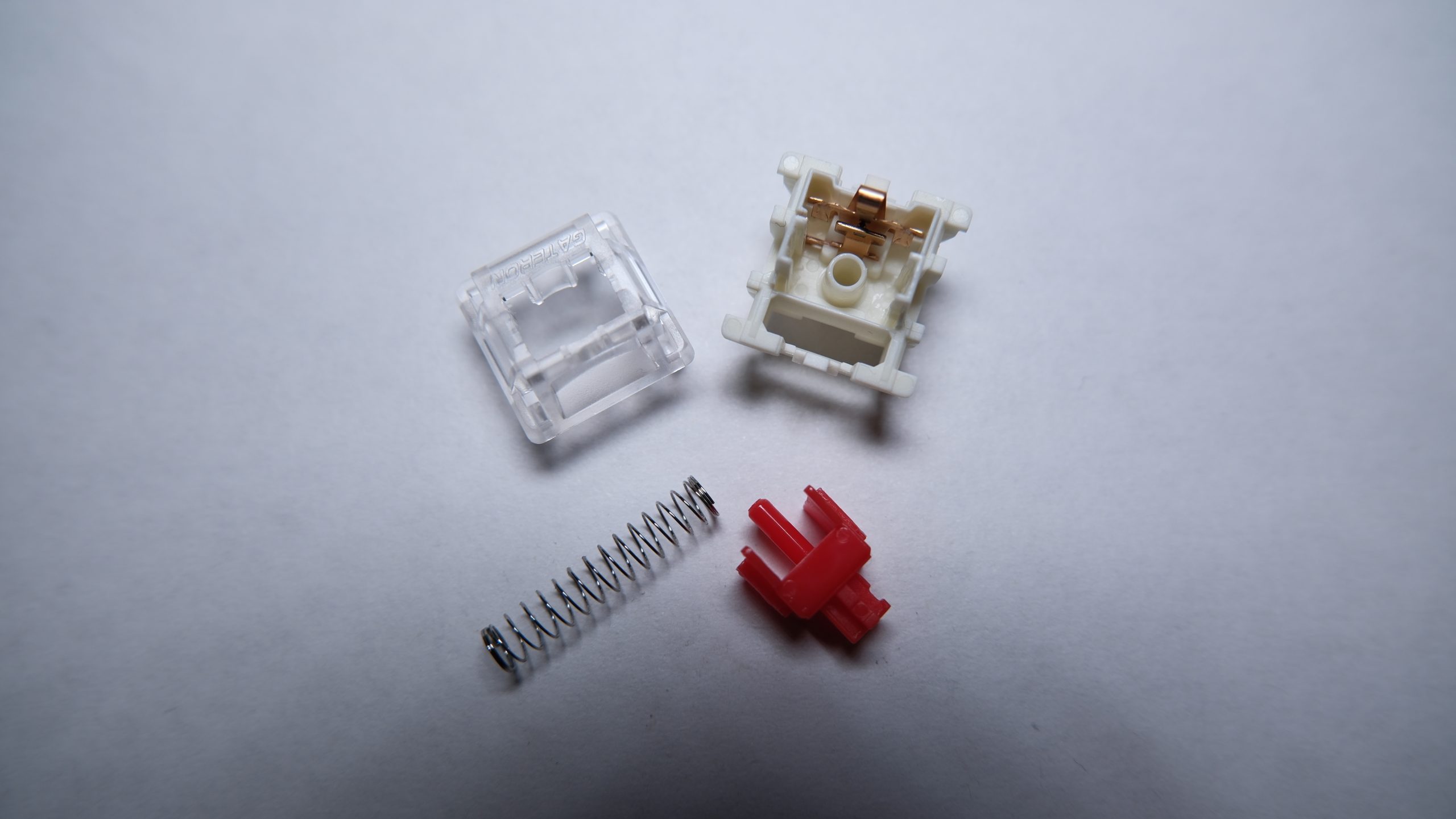 Gateron Jupiter Red switch disassembled.