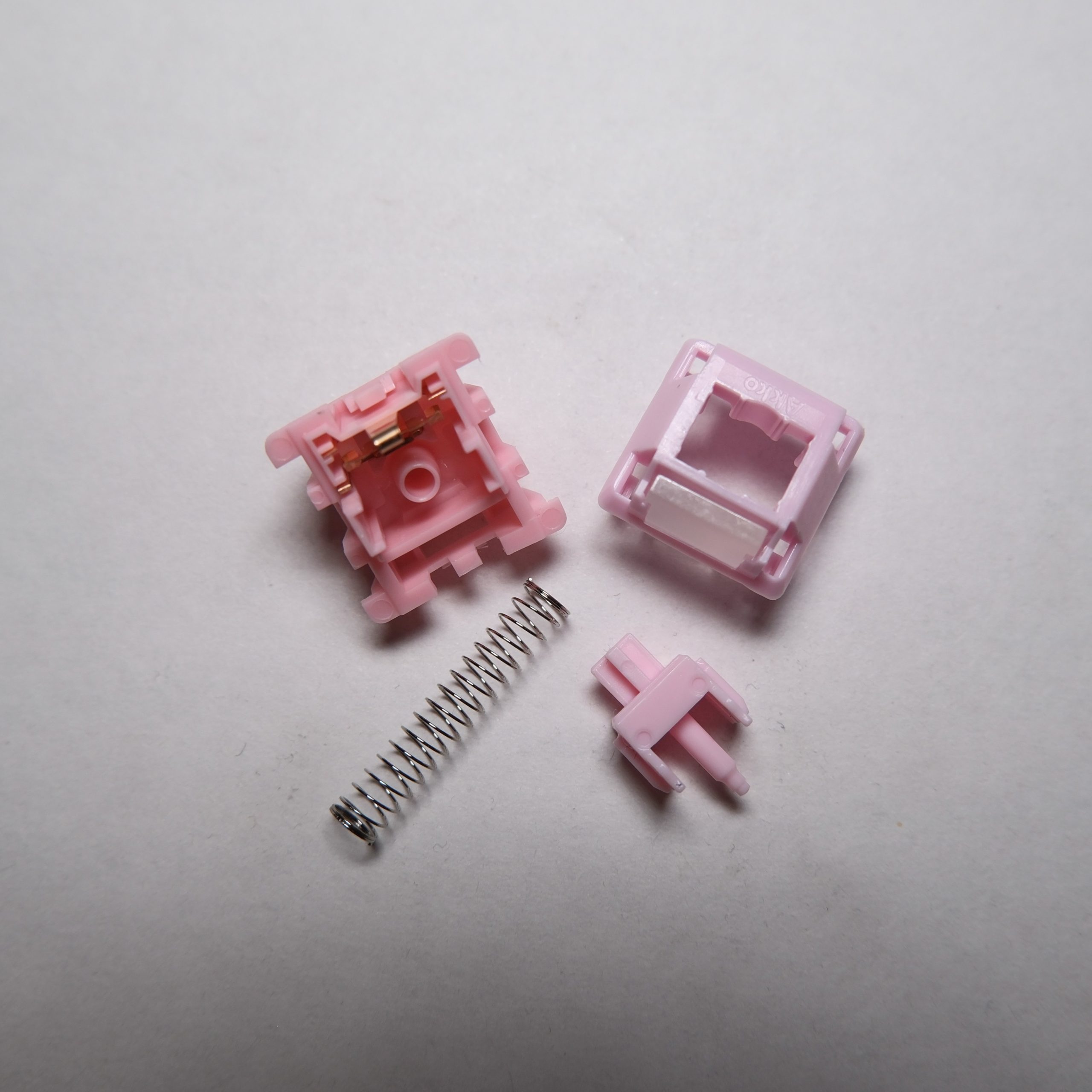 Akko Creamy Purple U1 switch disassembled.